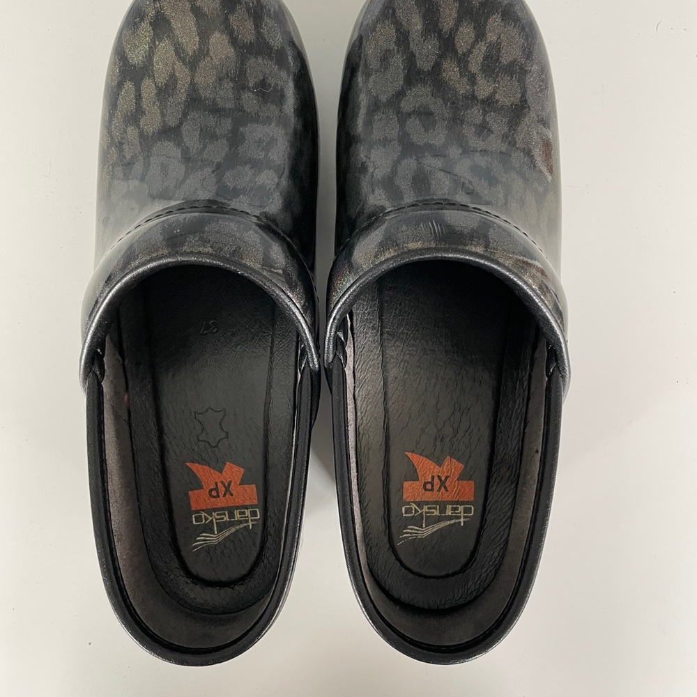 Dansko Black and Gray Animal Print Clogs